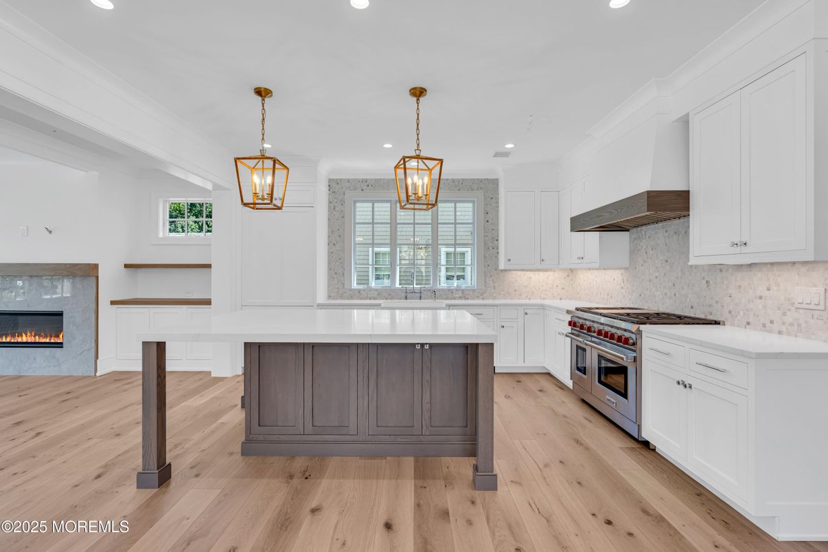 Fireplace, Interior, Kitchen, Pendant Lights, Recessed Lighting, Stainless Steel Appliances, Wood Texture Flooring