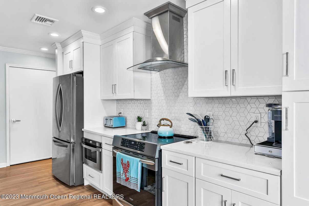 Interior, Kitchen, Recessed Lighting, Stainless Steel Appliances, Wood Texture Flooring