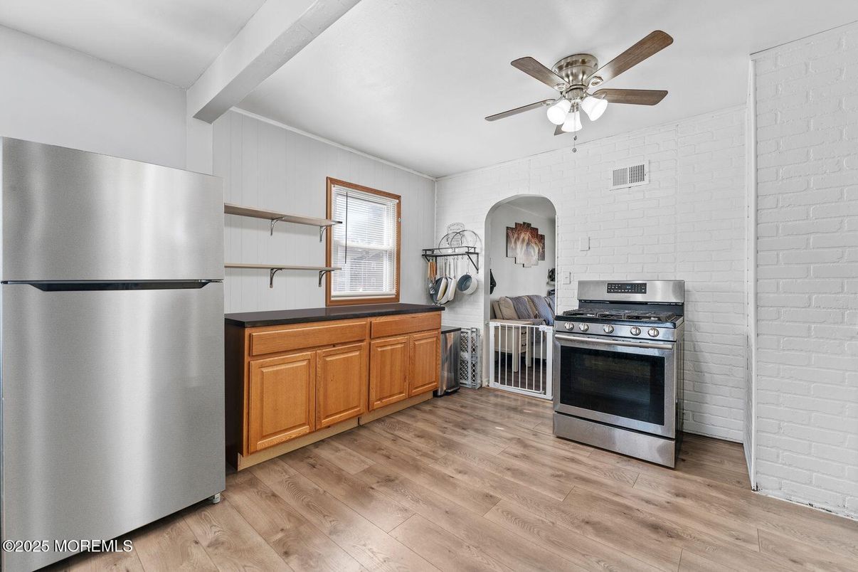 Interior, Kitchen, Stainless Steel Appliances, Stone Walls, Wood Texture Flooring