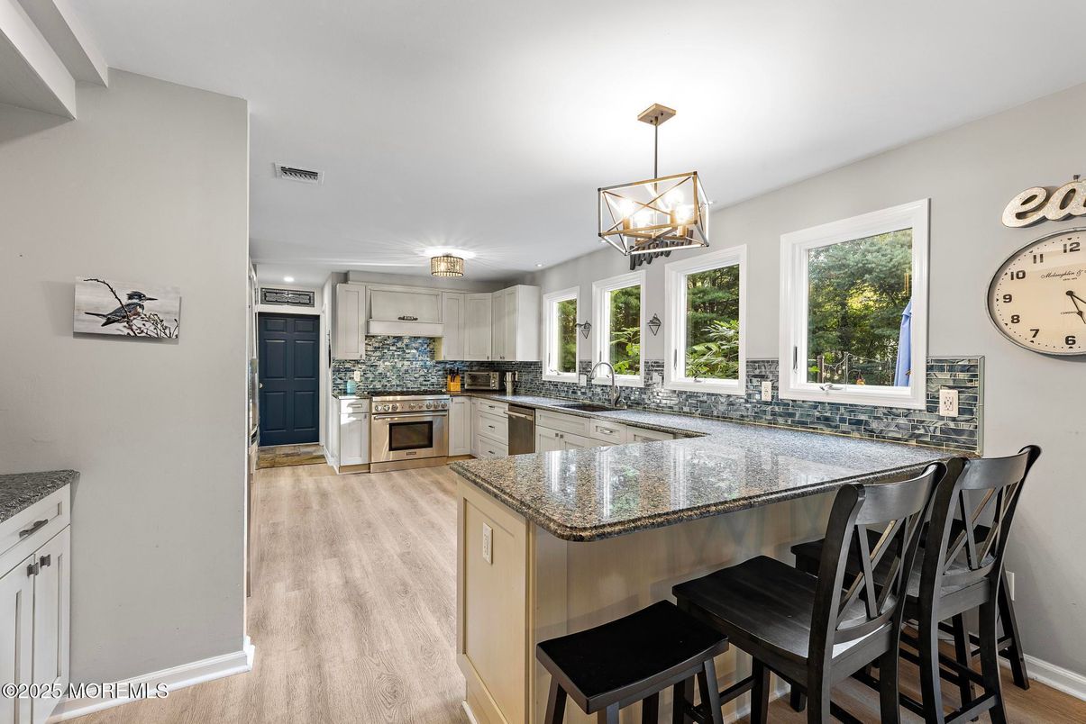 Interior, Kitchen, Pendant Lights, Stainless Steel Appliances, Wood Texture Flooring