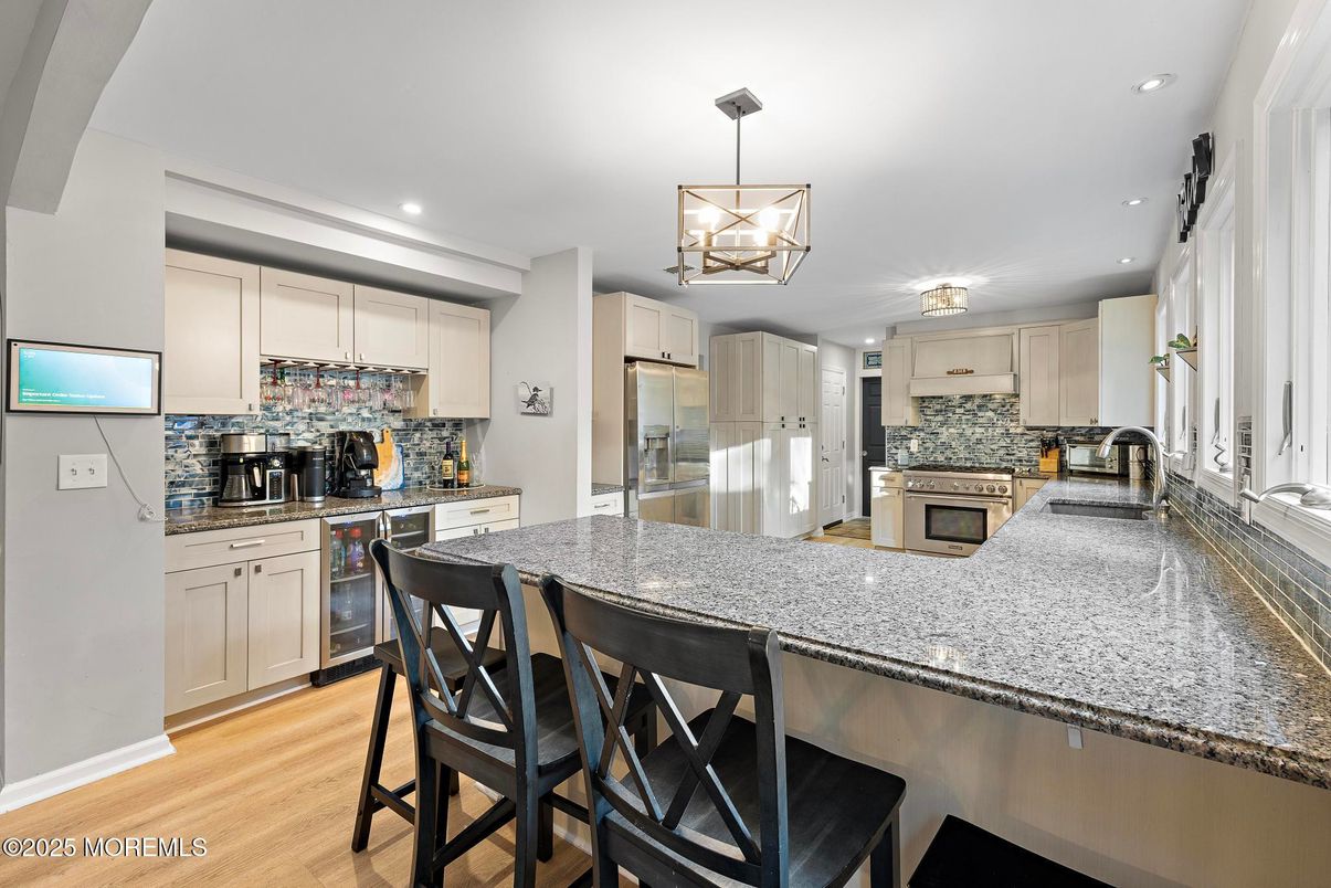 Chandelier, Interior, Kitchen, Recessed Lighting, Stainless Steel Appliances, Wood Texture Flooring