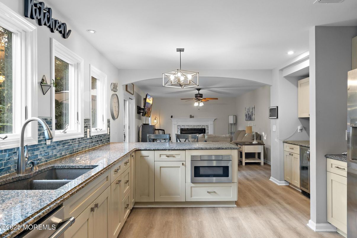 Fireplace, Interior, Kitchen, Recessed Lighting, Wood Texture Flooring