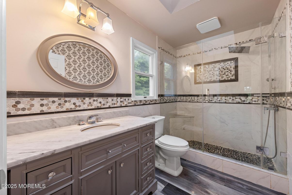 Bathroom, Glass Shower, Interior, Marble Walls, Wood Texture Flooring