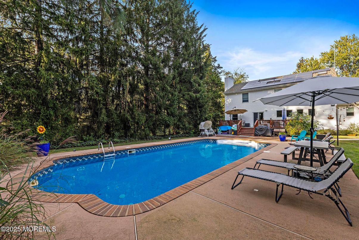 Exterior, Pool, Solar Panels