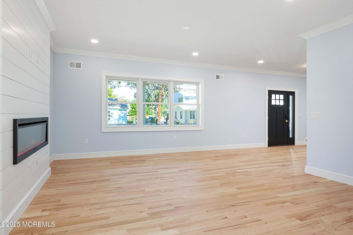Empty room, Fireplace, Interior, Recessed Lighting, Wood Texture Flooring