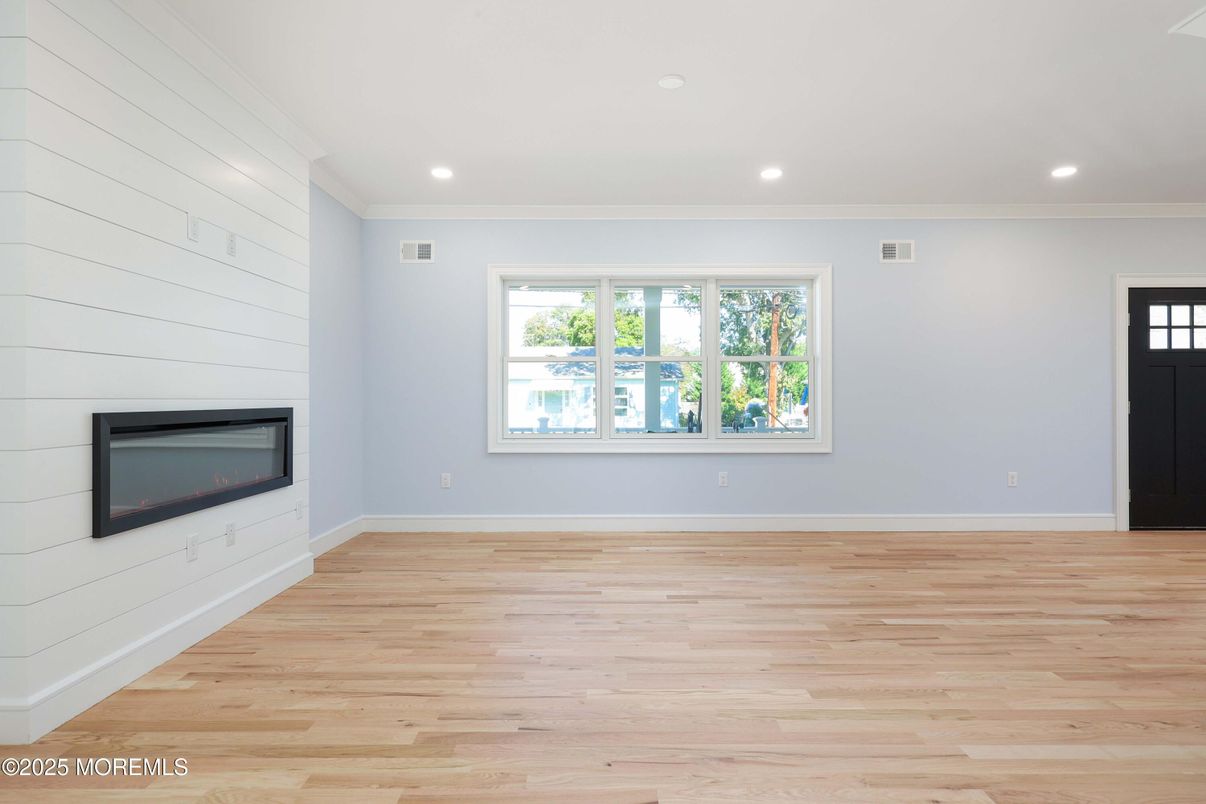Empty room, Fireplace, Interior, Recessed Lighting, Wood Texture Flooring