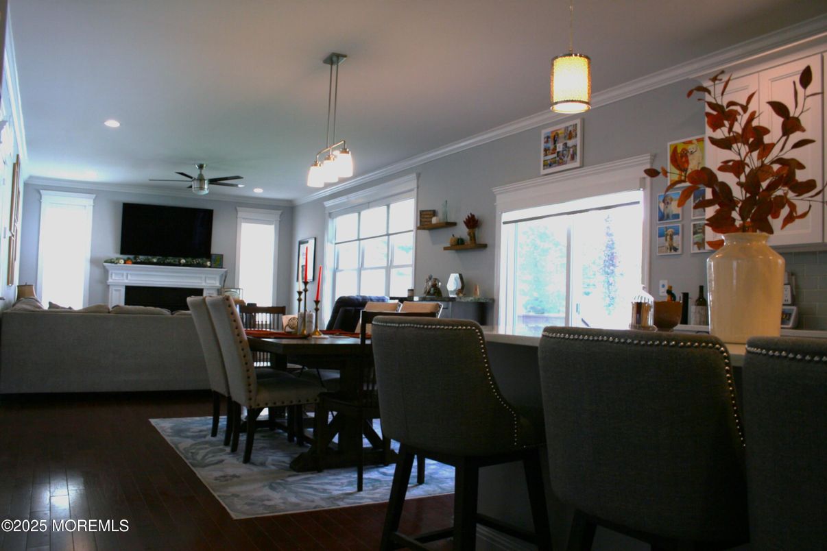 Dining room, Fireplace, Interior, Pendant Lights, Recessed Lighting, Wood Texture Flooring