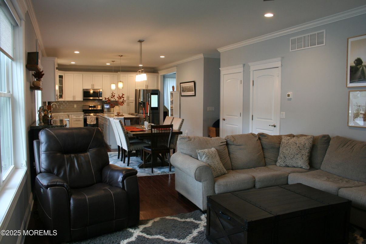 Dining room, Interior, Kitchen, Living room, Pendant Lights, Recessed Lighting, Stainless Steel Appliances, Wood Texture Flooring
