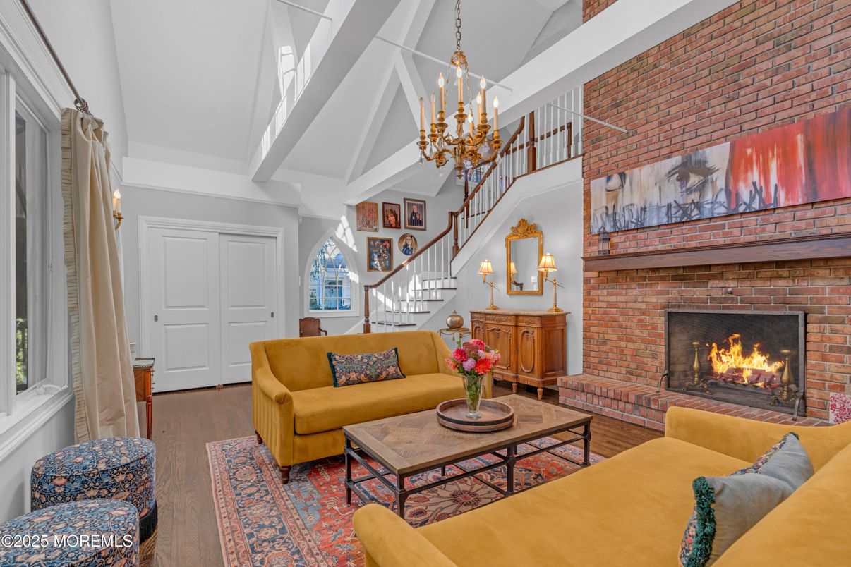 Chandelier, Fireplace, Interior, Living room, Stone Walls, Wood Texture Flooring