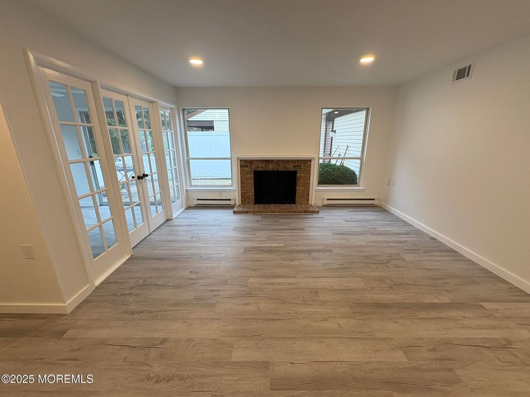 Empty room, Fireplace, Interior, Recessed Lighting, Wood Texture Flooring
