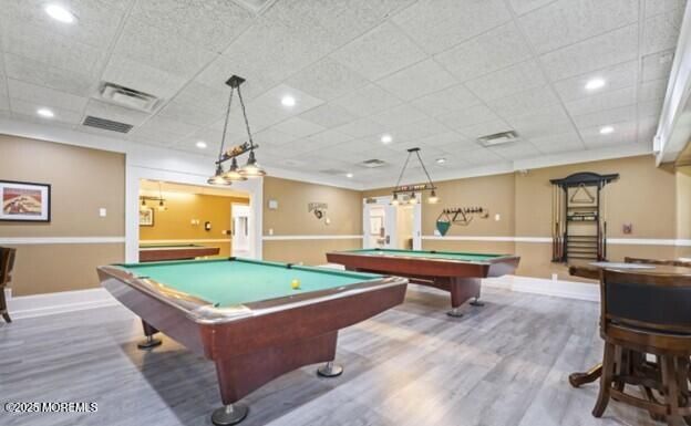 Billiard Table, Chandelier, Game Room, Interior, Pendant Lights, Recessed Lighting, Wood Texture Flooring