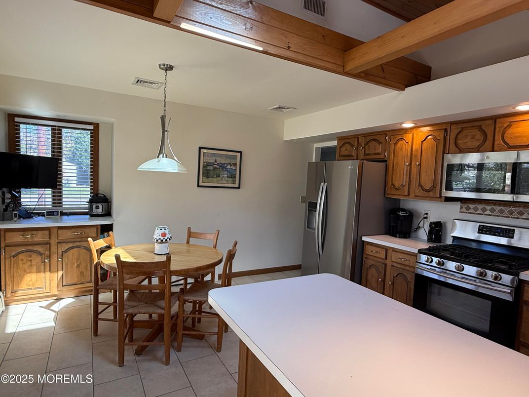 Dining room, Interior, Kitchen, Pendant Lights, Stainless Steel Appliances, Wooden Beams