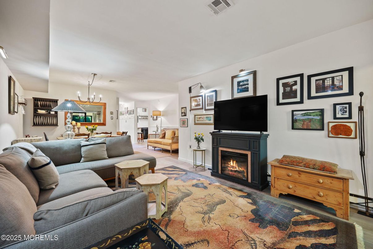 Dining room, Fireplace, Interior, Living room, Pendant Lights, Wood Texture Flooring