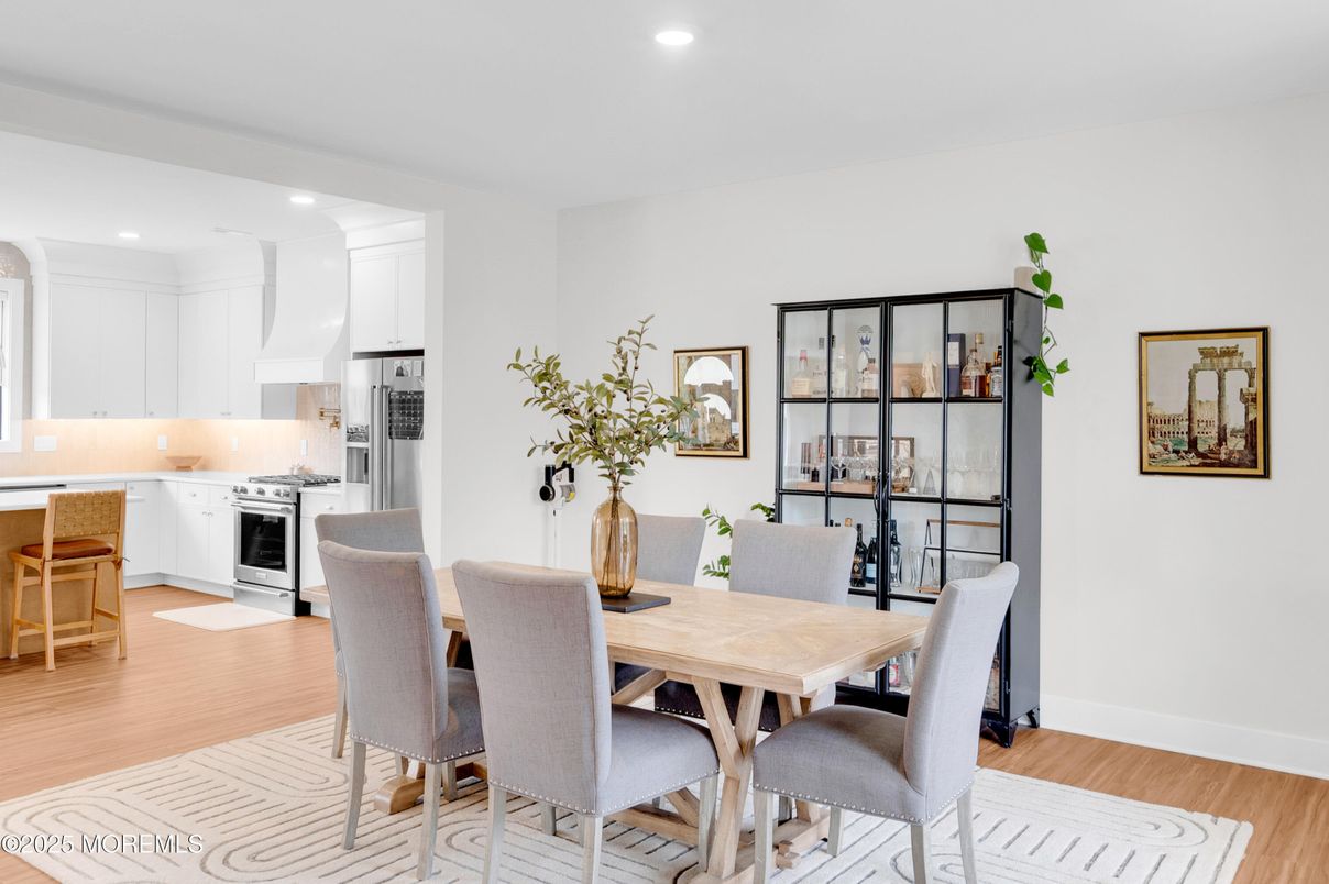 Dining room, Interior, Kitchen, Recessed Lighting, Stainless Steel Appliances, Wood Texture Flooring