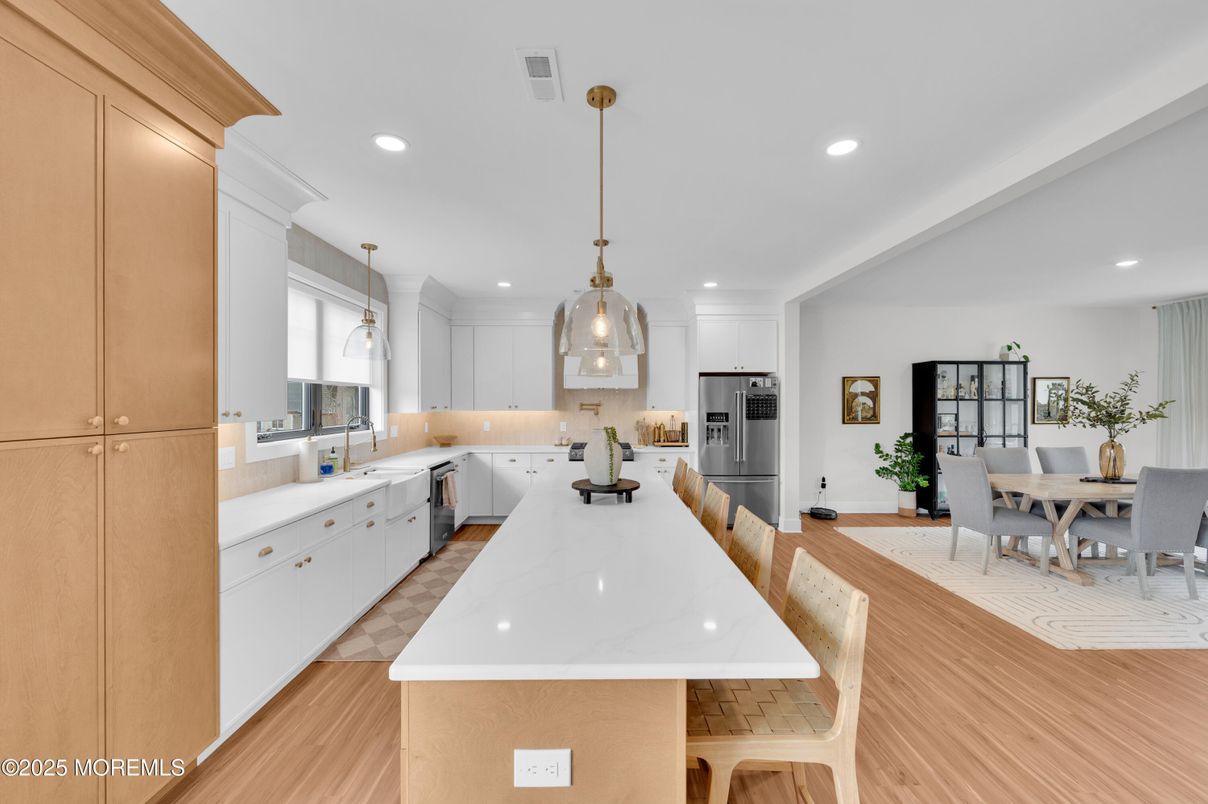 Dining room, Interior, Kitchen, Pendant Lights, Recessed Lighting, Stainless Steel Appliances, Wood Texture Flooring