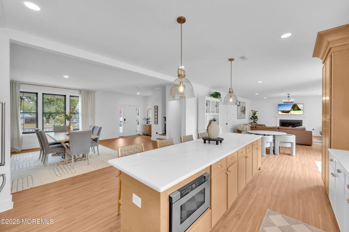 Dining room, Fireplace, Interior, Kitchen, Living room, Pendant Lights, Recessed Lighting, Wood Texture Flooring