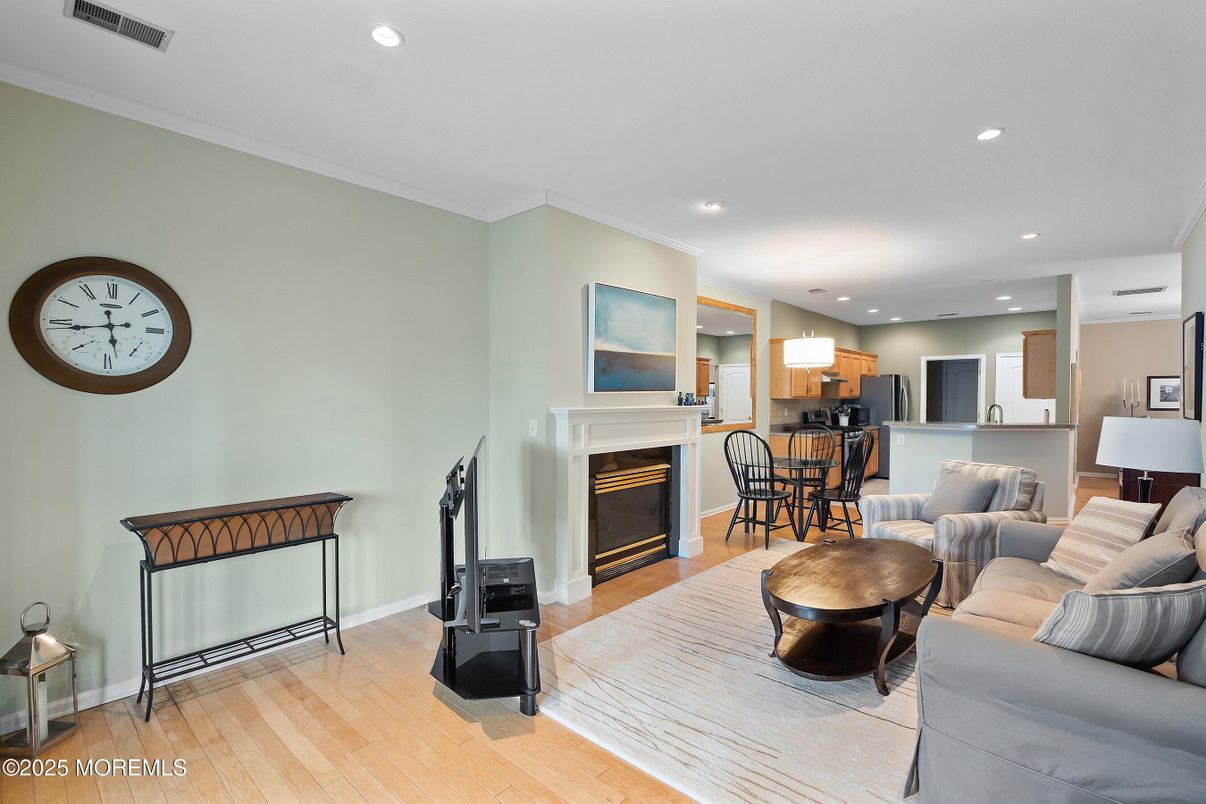 Dining room, Fireplace, Interior, Kitchen, Living room, Recessed Lighting, Wood Texture Flooring