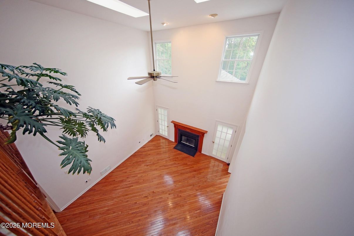 Empty room, Fireplace, Interior, Recessed Lighting, Wood Texture Flooring