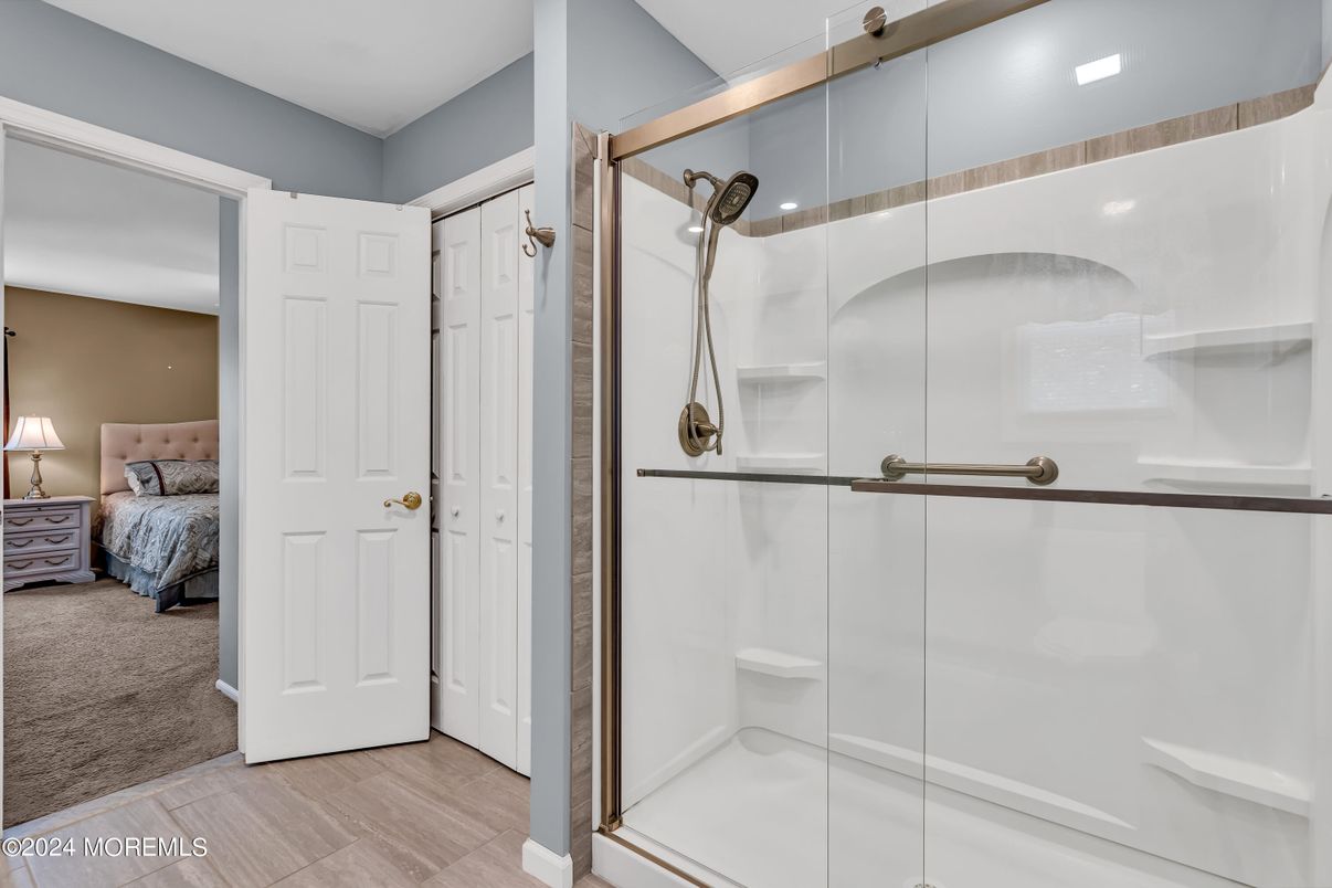 Bathroom, Bedroom, Glass Shower, Interior, Recessed Lighting, Wood Texture Flooring