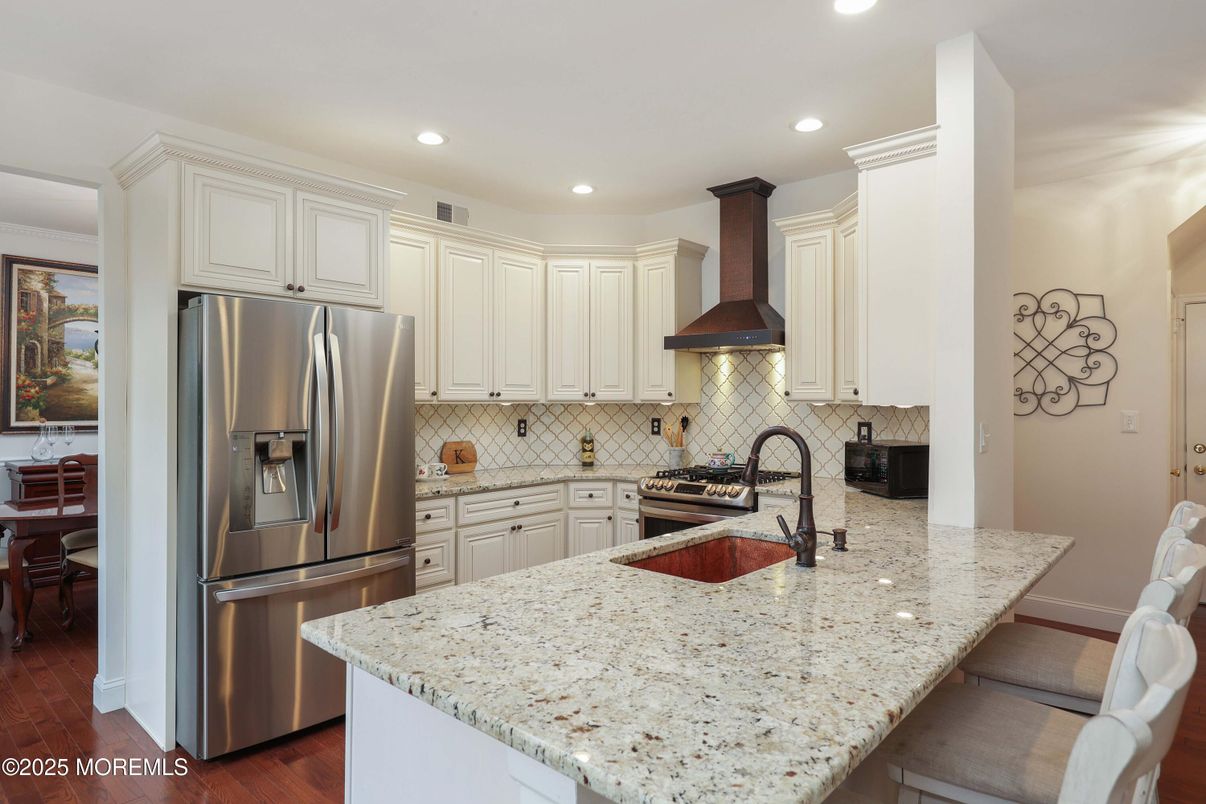 Dining room, Interior, Kitchen, Recessed Lighting, Stainless Steel Appliances, Wood Texture Flooring