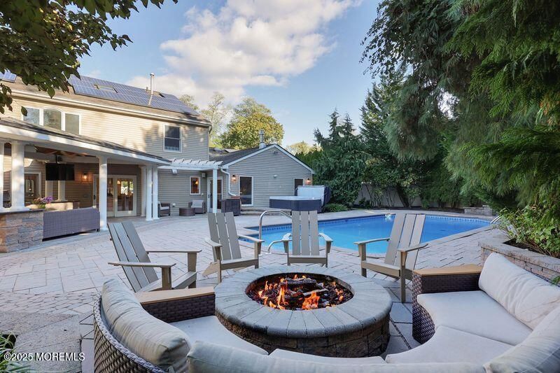 Exterior, Pool, Solar Panels