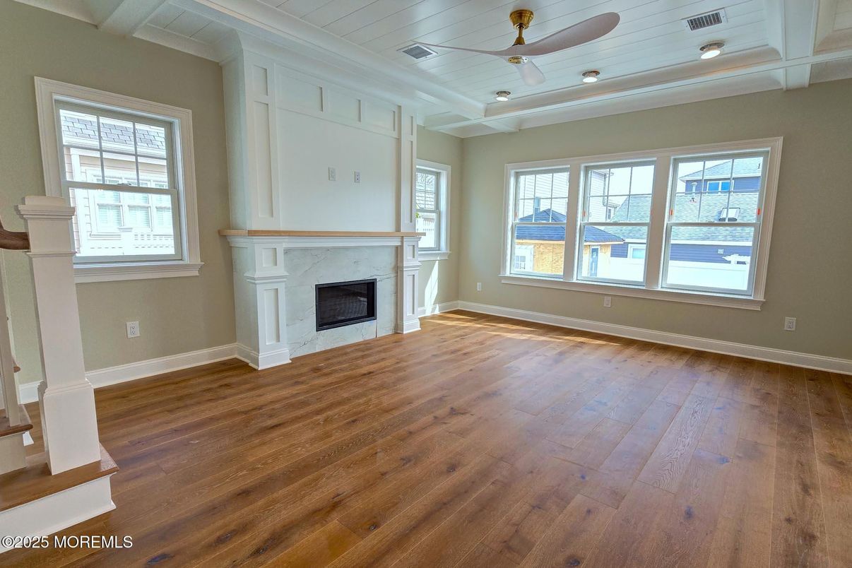 Empty room, Fireplace, Interior, Recessed Lighting, Wood Texture Flooring