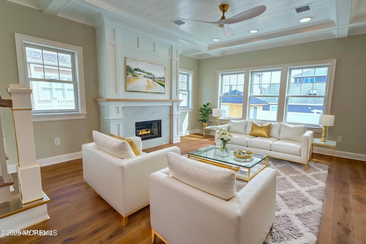 Fireplace, Interior, Living room, Recessed Lighting, Water, Wood Texture Flooring