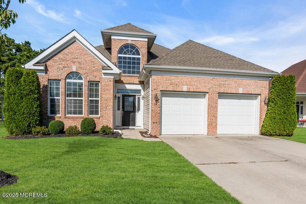 Attached, Exterior, Facade, Brick Facade, Brick Traditional