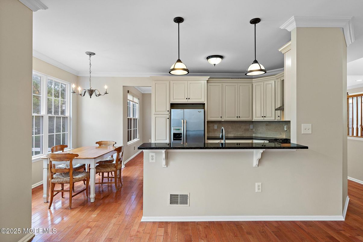 Chandelier, Dining room, Interior, Kitchen, Pendant Lights, Stainless Steel Appliances, Wood Texture Flooring