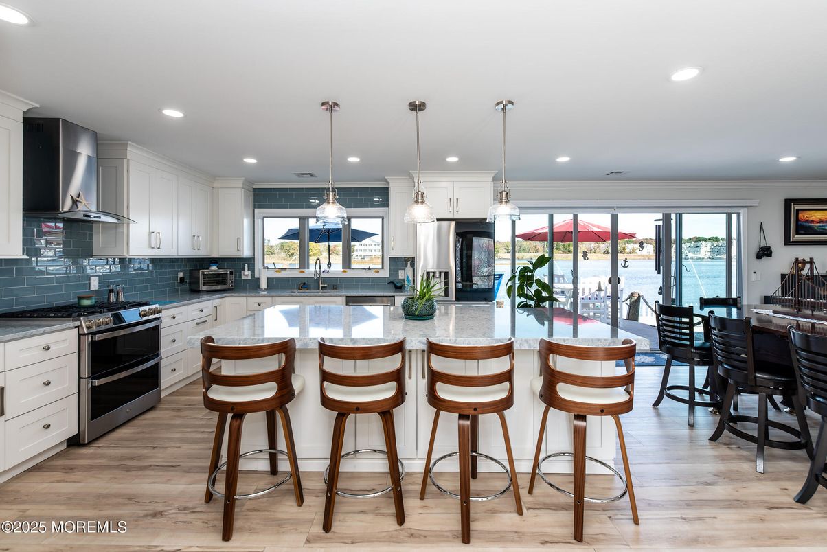 Dining room, Interior, Kitchen, Pendant Lights, Recessed Lighting, Water, Wood Texture Flooring
