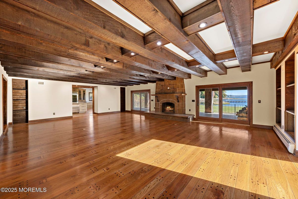 Empty room, Fireplace, Interior, Recessed Lighting, Wooden Beams, Wood Texture Flooring