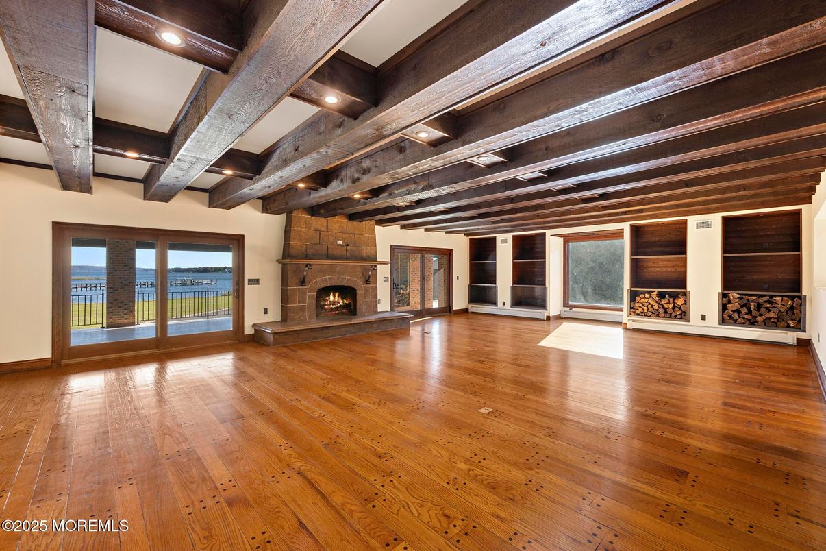 Empty room, Fireplace, Interior, Recessed Lighting, Wooden Beams, Wood Texture Flooring