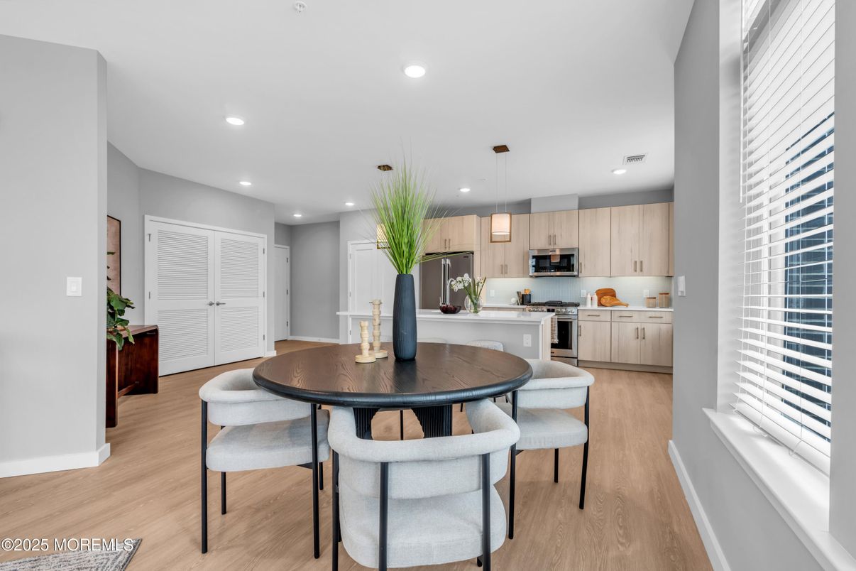Dining room, Interior, Kitchen, Pendant Lights, Recessed Lighting, Stainless Steel Appliances, Wood Texture Flooring