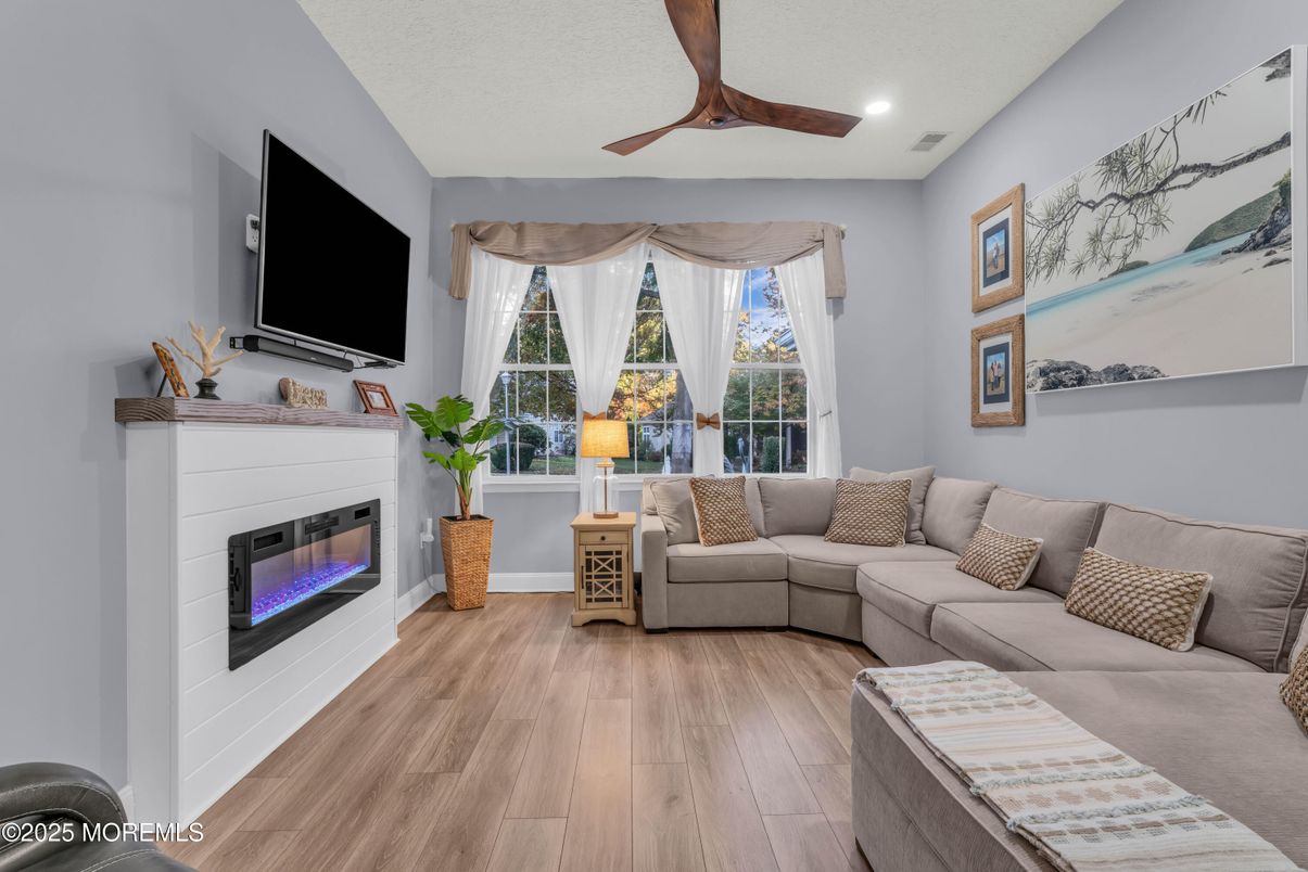 Fireplace, Interior, Living room, Recessed Lighting, Wood Texture Flooring