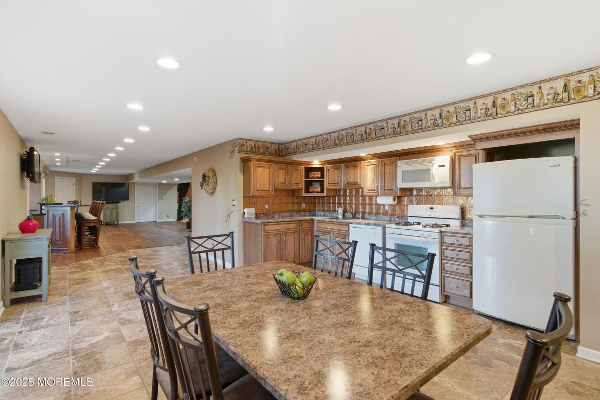 Dining room, Fireplace, Interior, Kitchen, Recessed Lighting, Wood Texture Flooring