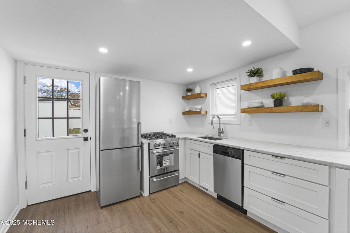 Interior, Kitchen, Recessed Lighting, Stainless Steel Appliances, Wood Texture Flooring