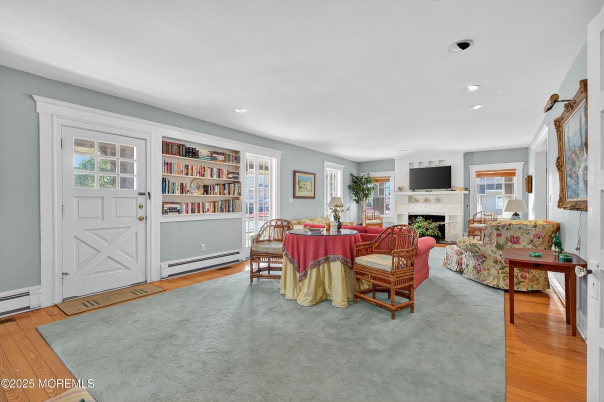 Dining room, Fireplace, Interior, Living room, Recessed Lighting, Wood Texture Flooring