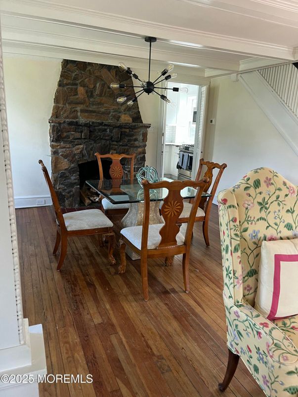 Dining room, Fireplace, Interior, Pendant Lights, Wood Texture Flooring
