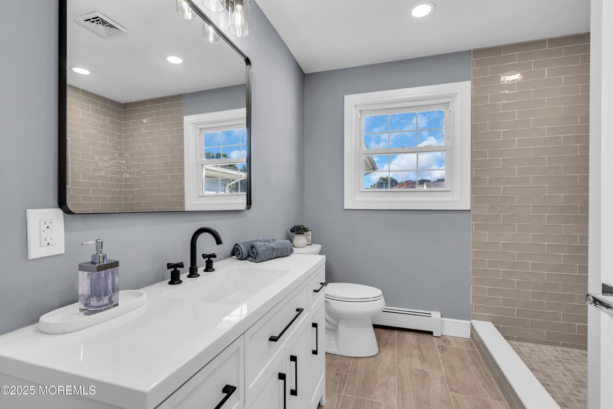 Bathroom, Dual Sink Vanities, Interior, Recessed Lighting, Wood Texture Flooring