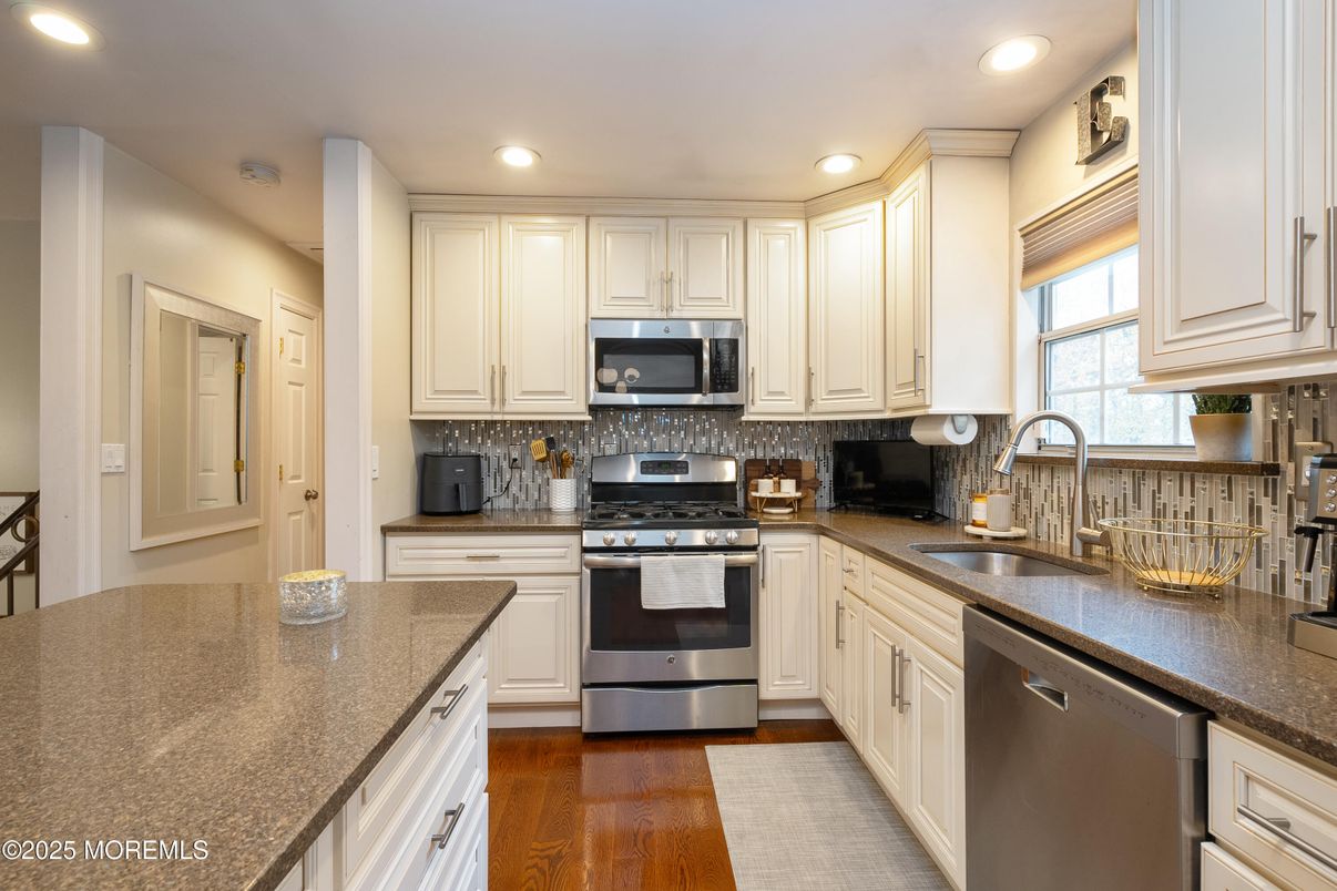 Interior, Kitchen, Recessed Lighting, Stainless Steel Appliances, Wood Texture Flooring