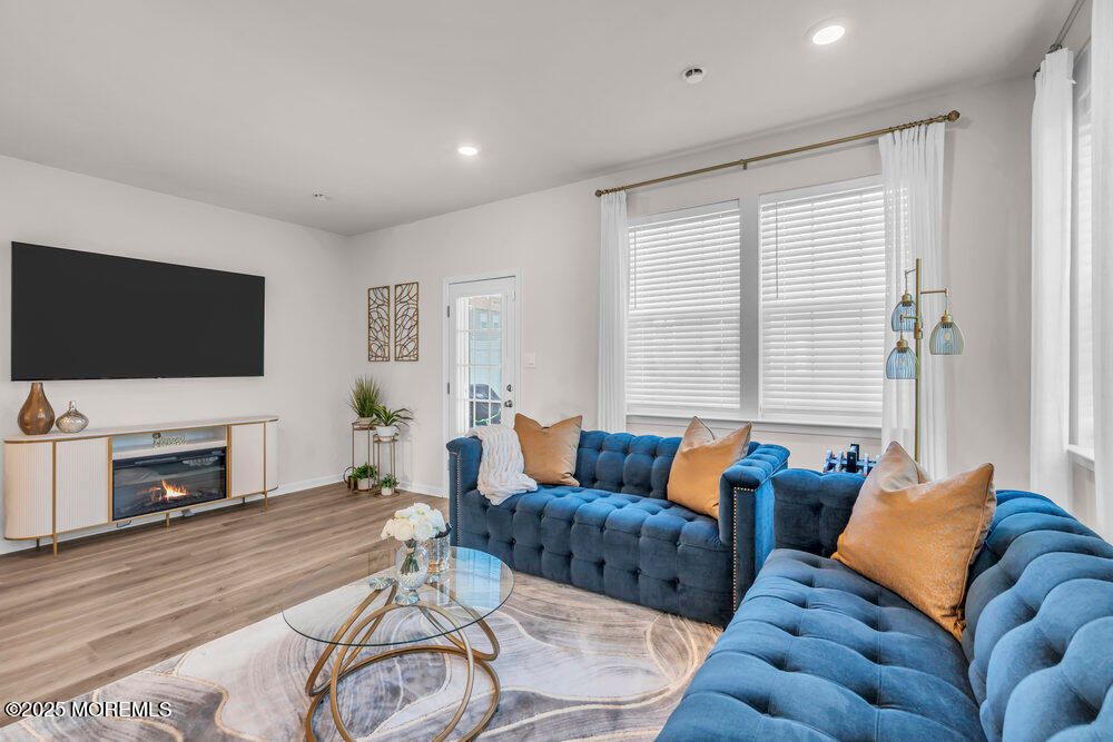 Fireplace, Interior, Living room, Recessed Lighting, Wood Texture Flooring