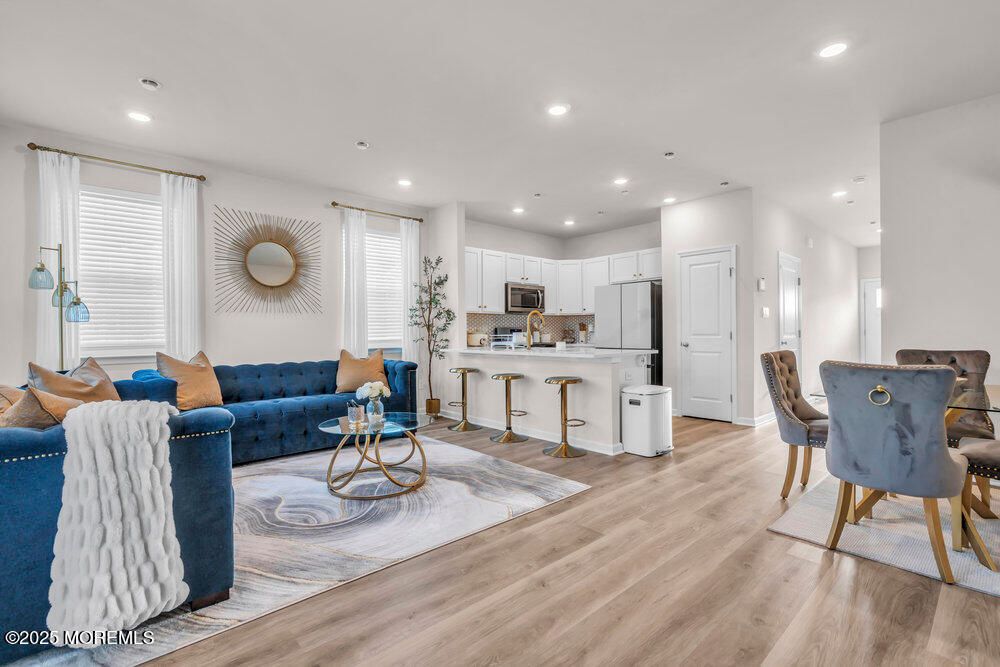 Dining room, Interior, Kitchen, Living room, Recessed Lighting, Stainless Steel Appliances, Wood Texture Flooring