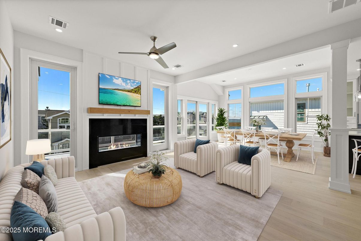Dining room, Fireplace, Interior, Living room, Recessed Lighting, Wood Texture Flooring
