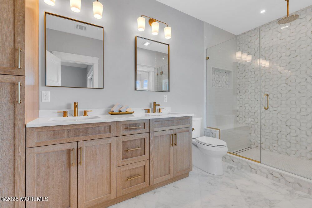 Bathroom, Dual Sink Vanities, Glass Shower, Interior, Marble, Recessed Lighting