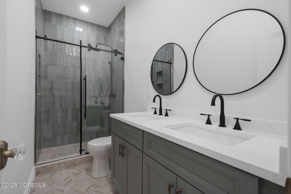 Bathroom, Dual Sink Vanities, Glass Shower, Interior, Recessed Lighting, Wood Texture Flooring