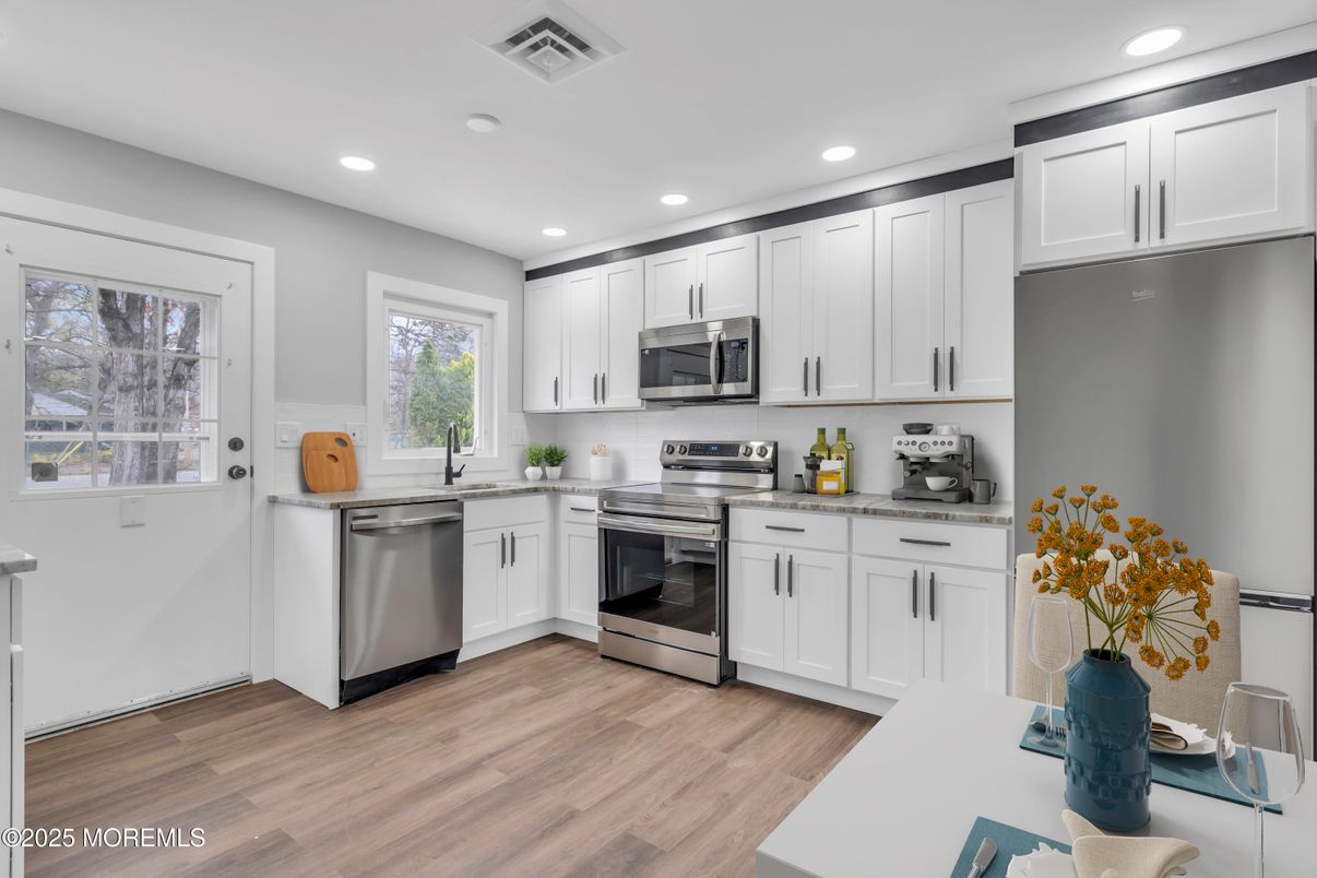 Interior, Kitchen, Recessed Lighting, Stainless Steel Appliances, Wood Texture Flooring