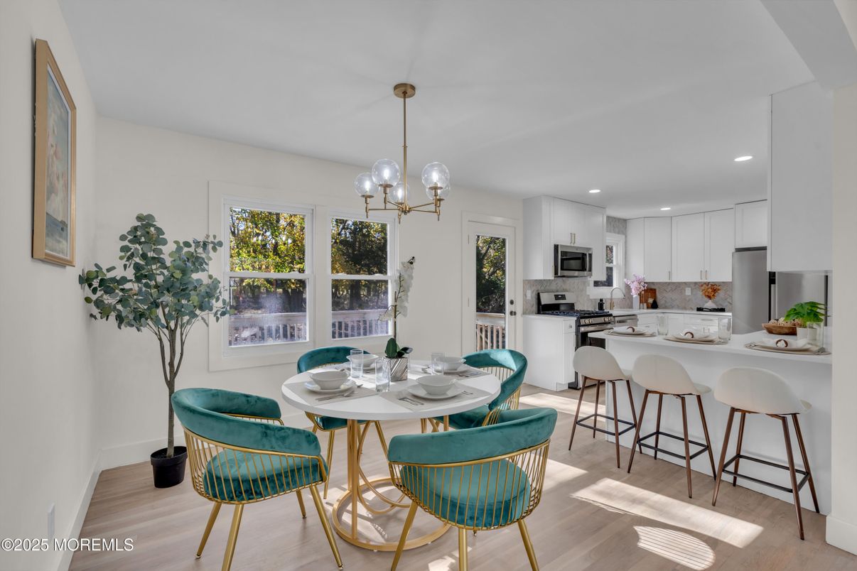 Dining room, Interior, Kitchen, Pendant Lights, Recessed Lighting, Stainless Steel Appliances, Wood Texture Flooring