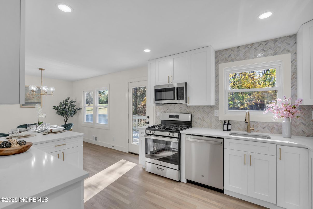 Interior, Kitchen, Pendant Lights, Recessed Lighting, Stainless Steel Appliances, Wood Texture Flooring