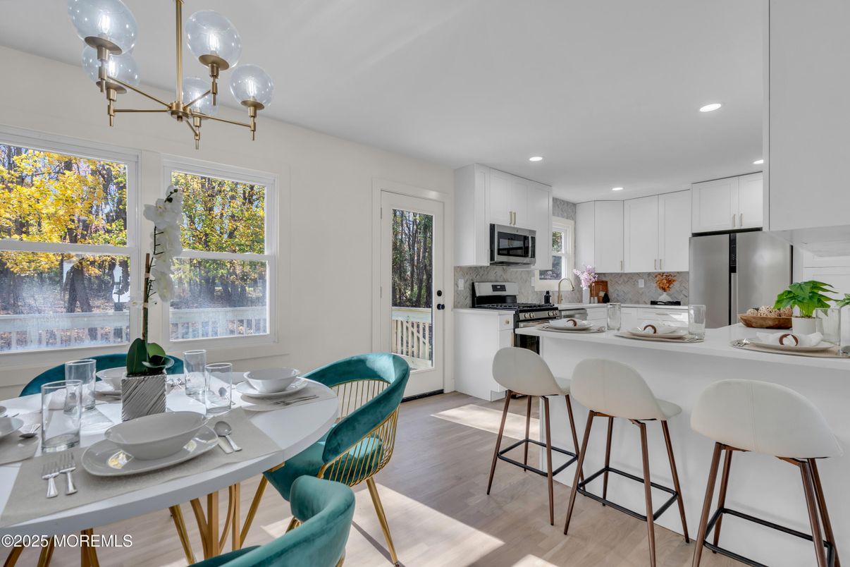 Dining room, Interior, Kitchen, Recessed Lighting, Stainless Steel Appliances, Wood Texture Flooring