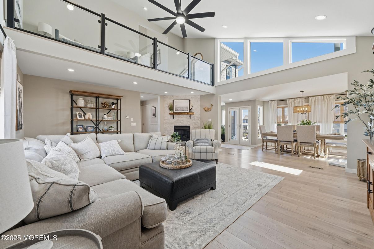 Dining room, Fireplace, Interior, Living room, Recessed Lighting, Wood Texture Flooring